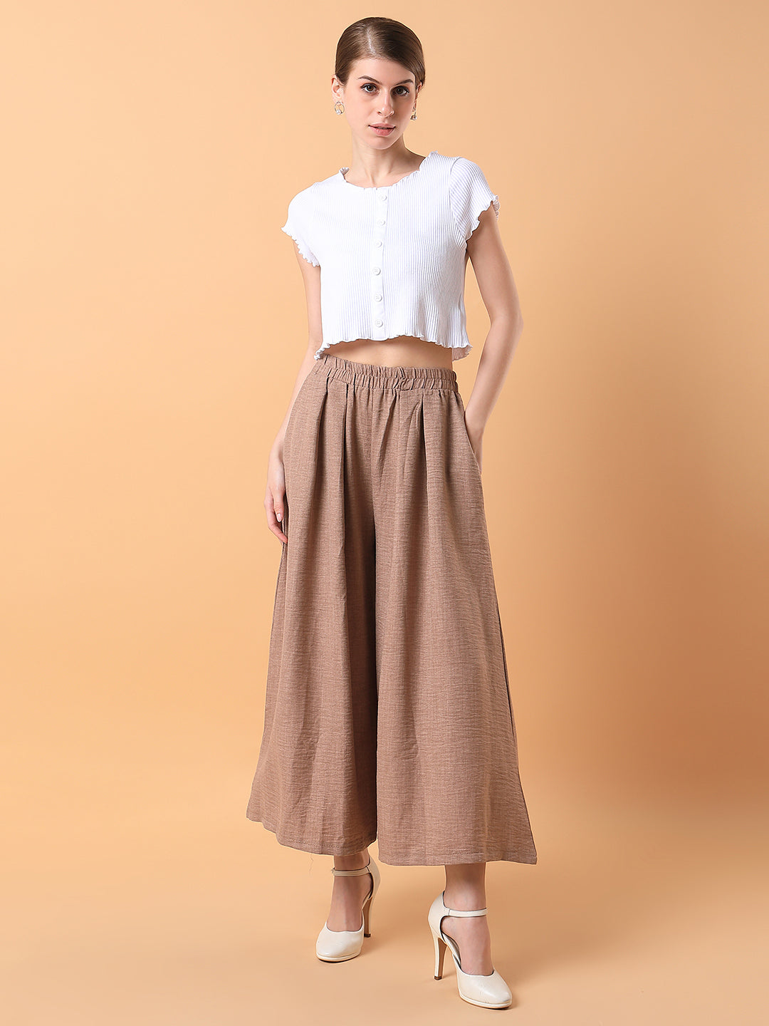 Women Solid Beige Pleated Loose Fit Trouser