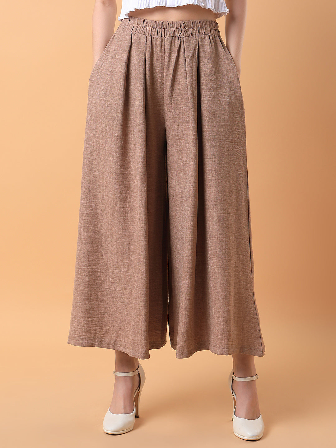 Women Solid Beige Pleated Loose Fit Trouser