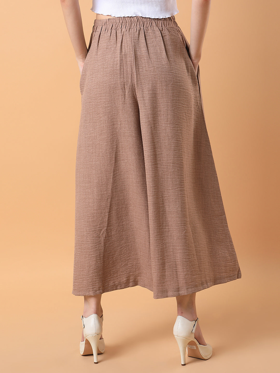 Women Solid Beige Pleated Loose Fit Trouser