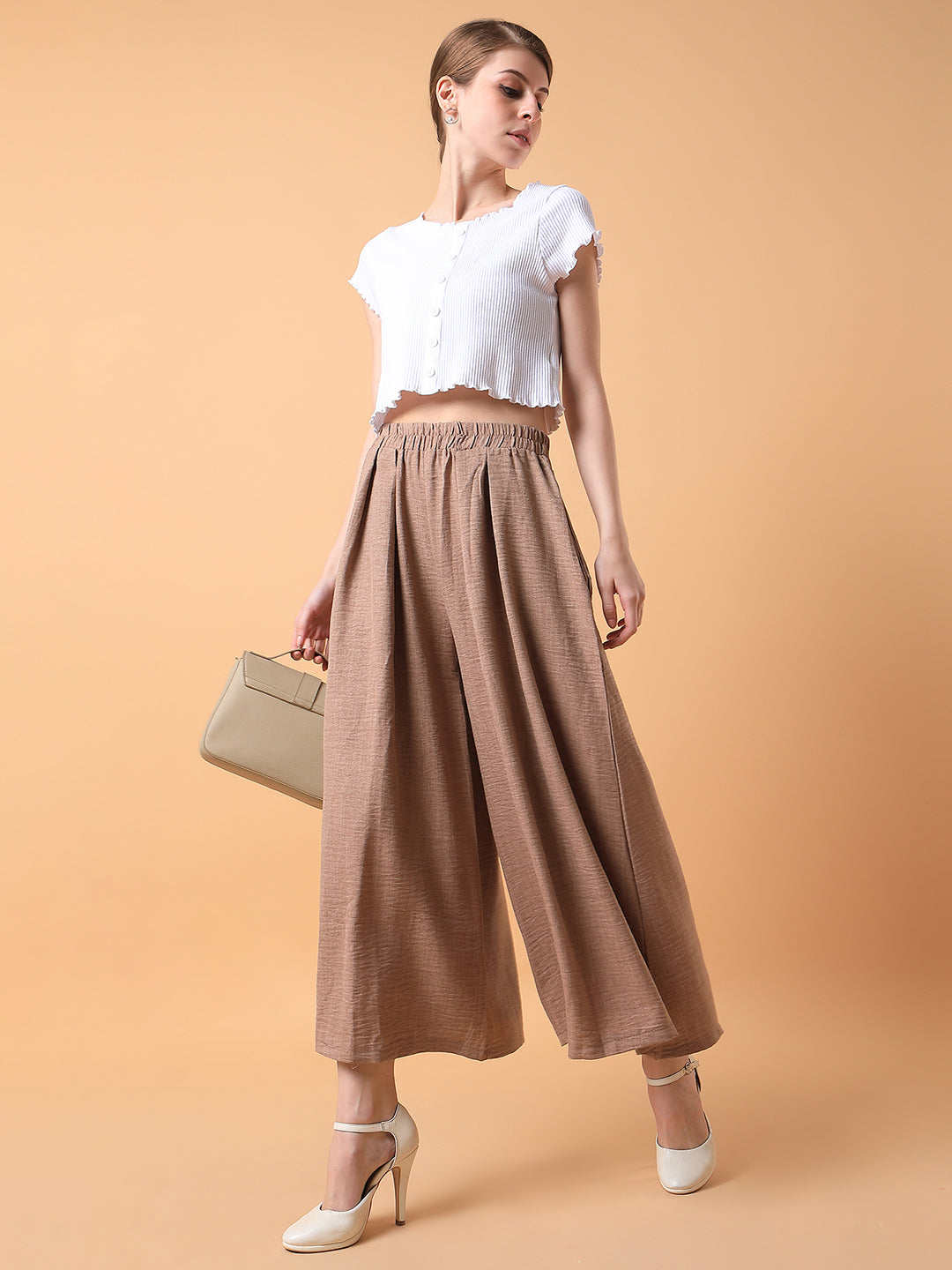 Women Solid Beige Pleated Loose Fit Trouser