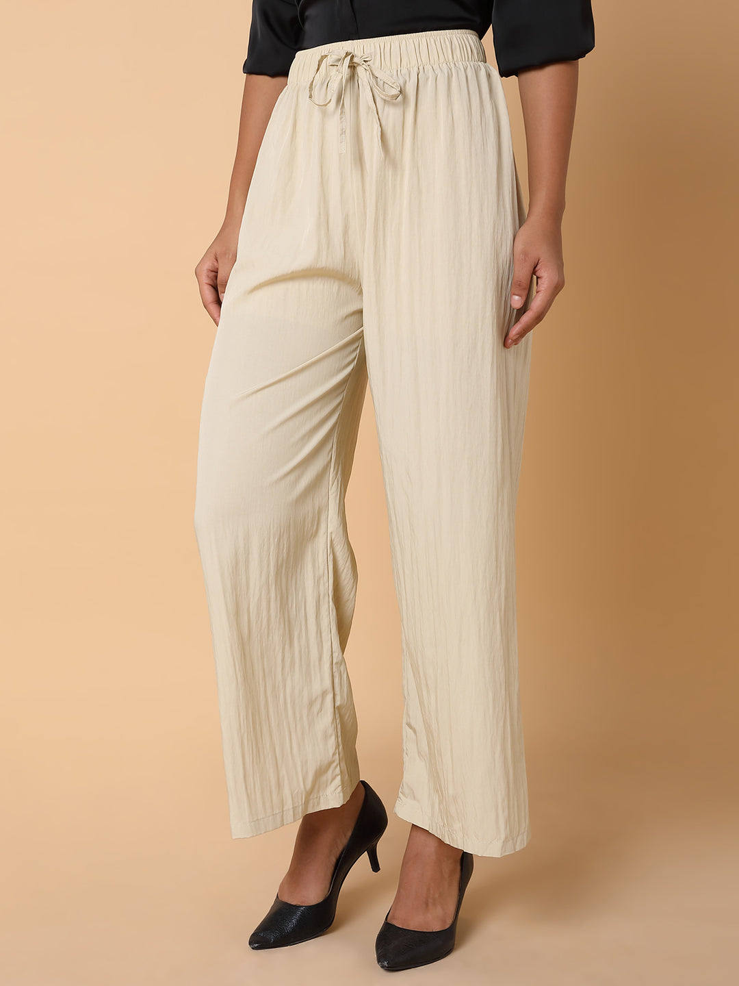 Women Solid Cream Straight Trouser