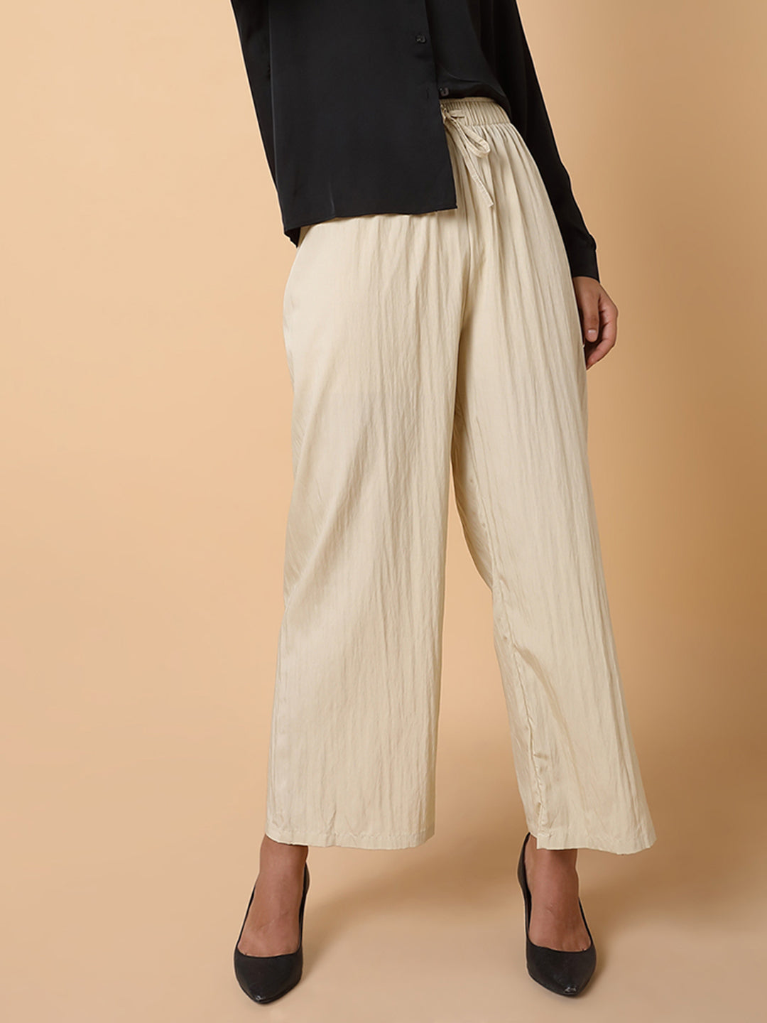 Women Solid Cream Straight Trouser