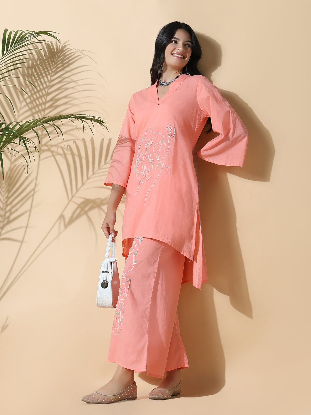 Women Abstract A-Line Thread Work Peach Kurta with Palazzos