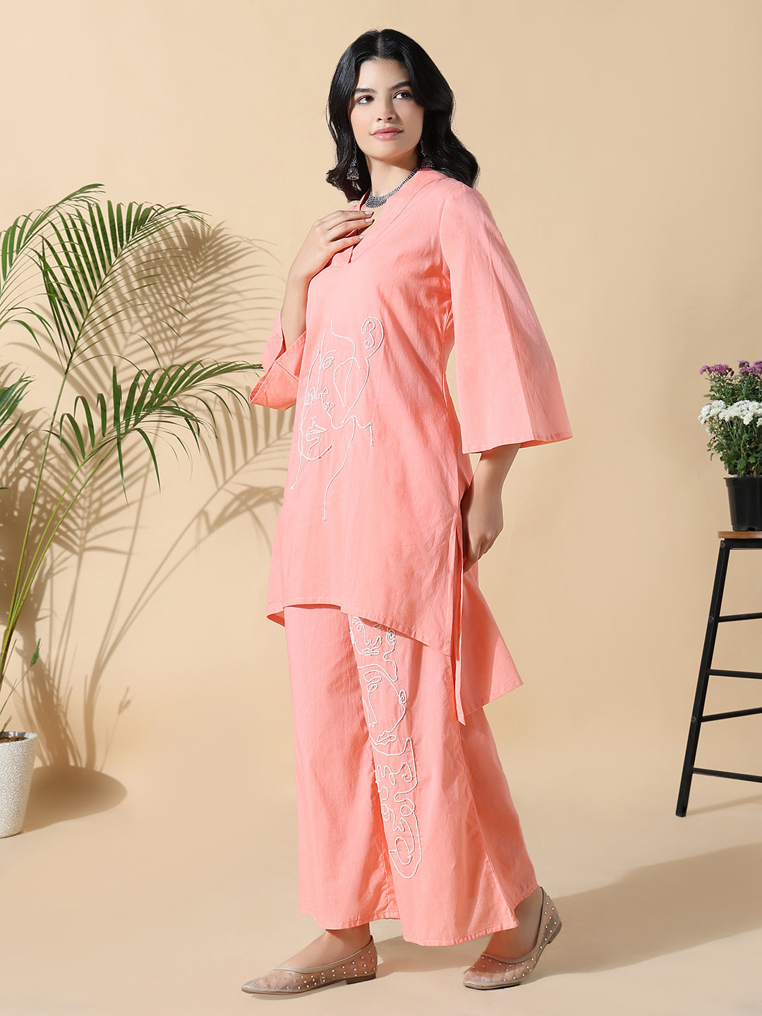 Women Abstract A-Line Thread Work Peach Kurta with Palazzos