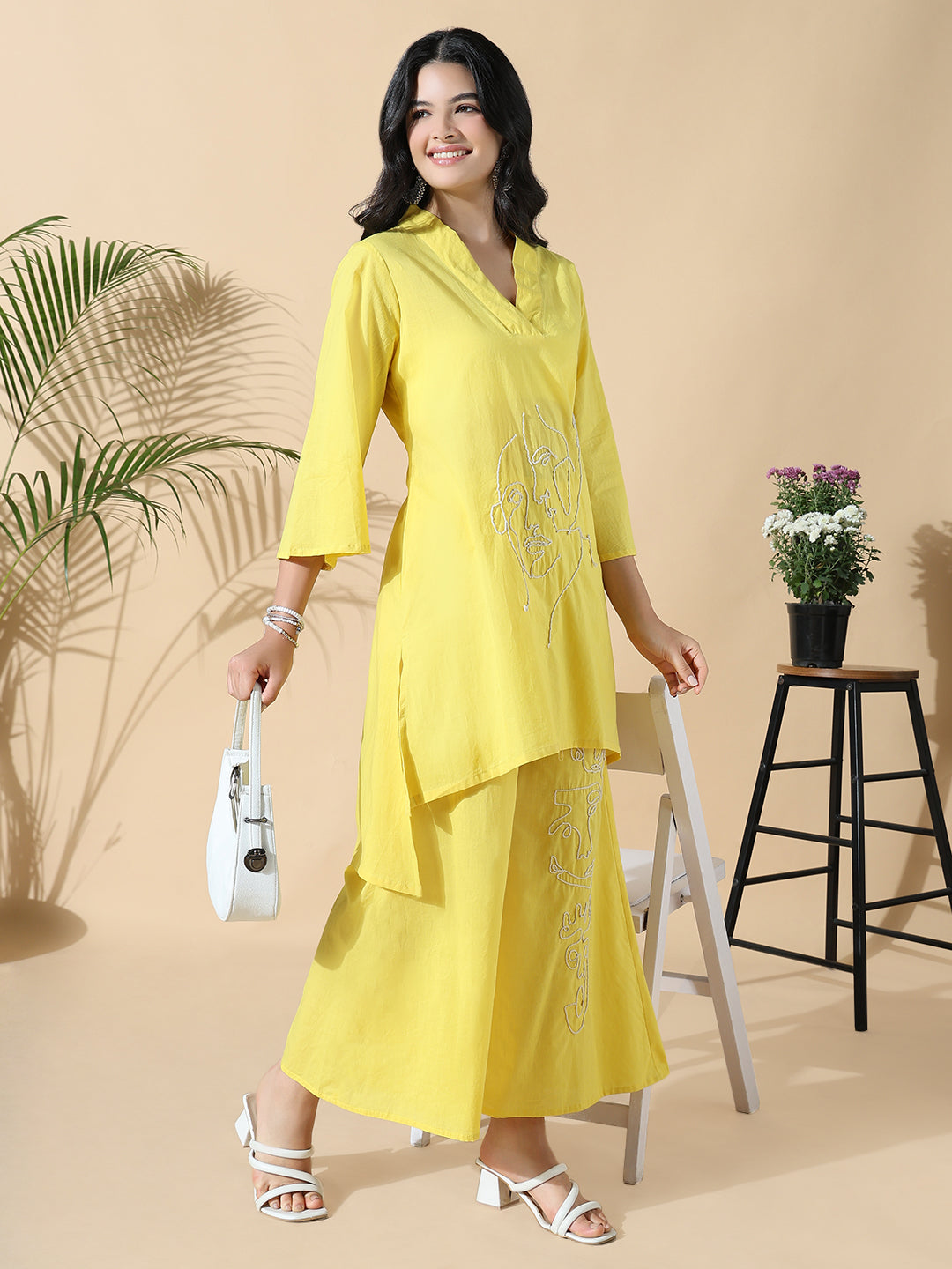 Women Abstract A-Line Thread Work Yellow Kurta with Palazzos