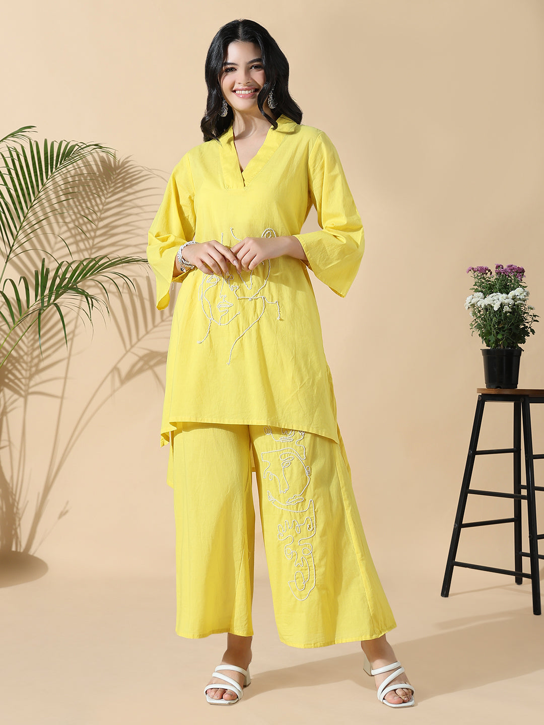 Women Abstract A-Line Thread Work Yellow Kurta with Palazzos