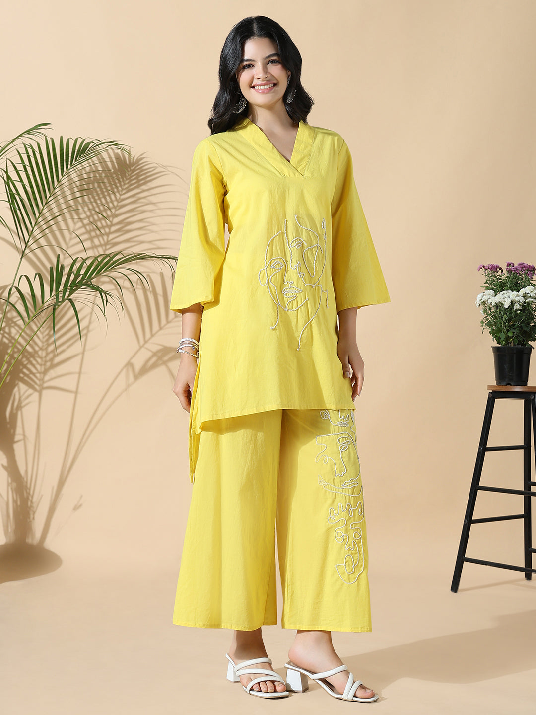 Women Abstract A-Line Thread Work Yellow Kurta with Palazzos