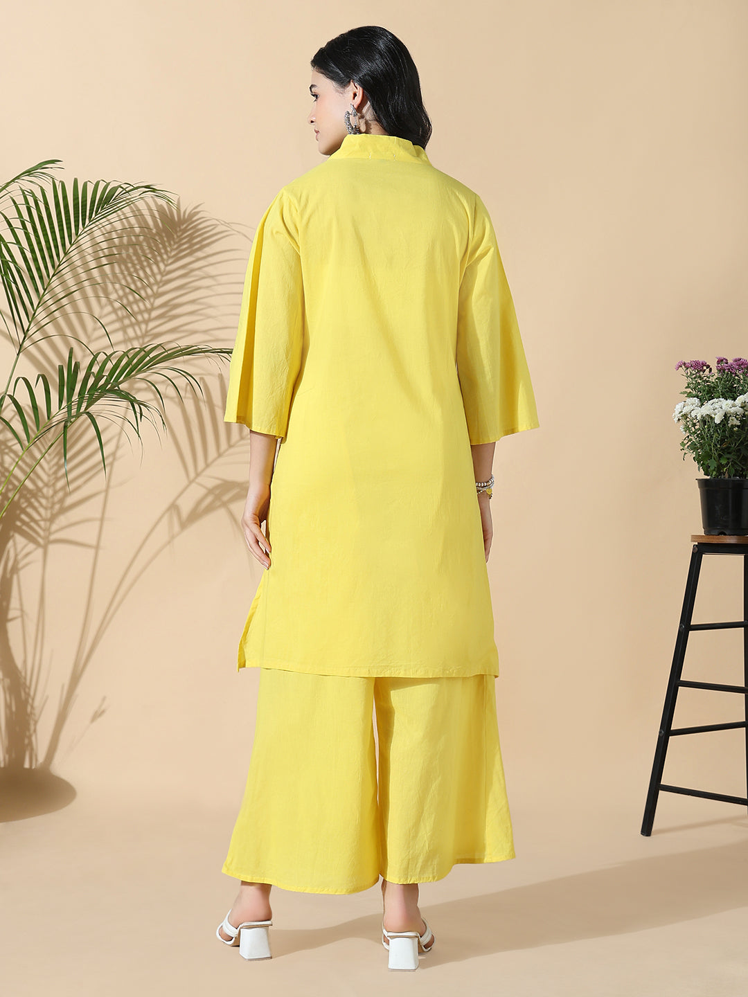 Women Abstract A-Line Thread Work Yellow Kurta with Palazzos