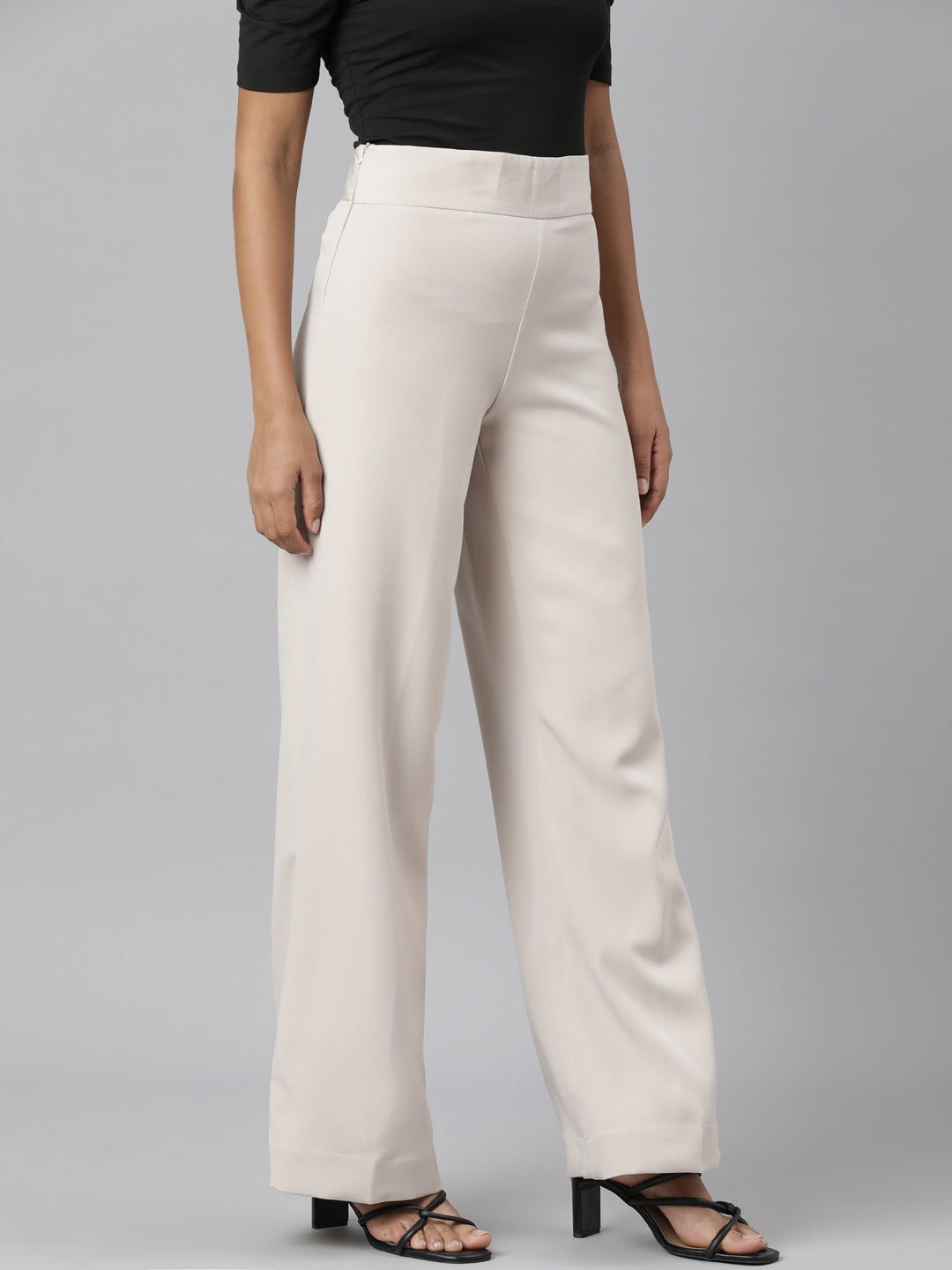 Women Beige Solid Parallel Trousers