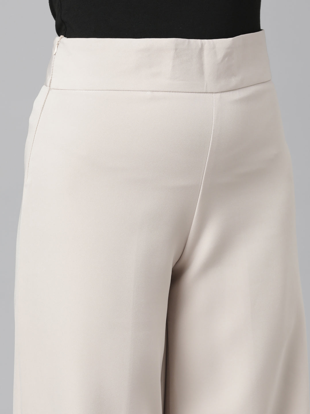 Women Beige Solid Parallel Trousers