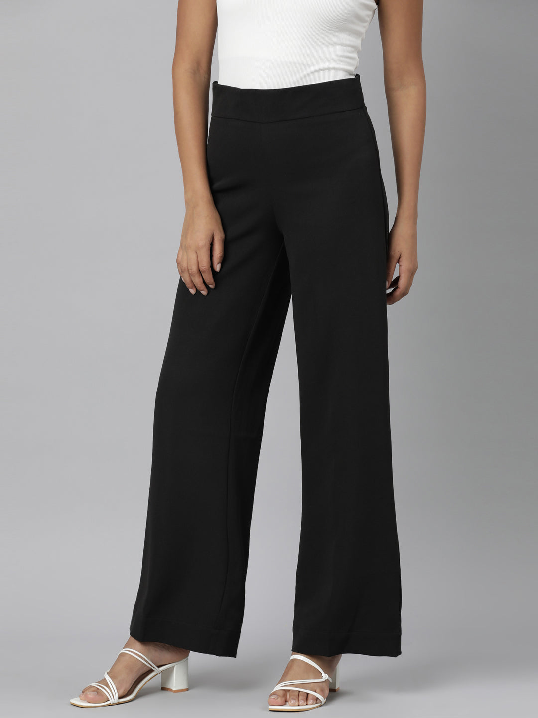 Women Black Solid Parallel Trousers