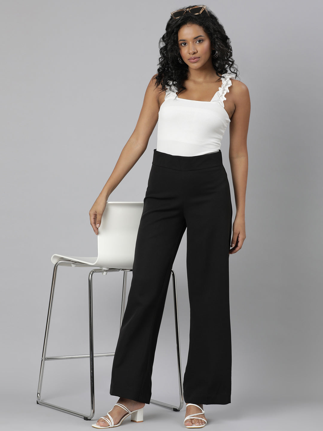 Women Black Solid Parallel Trousers