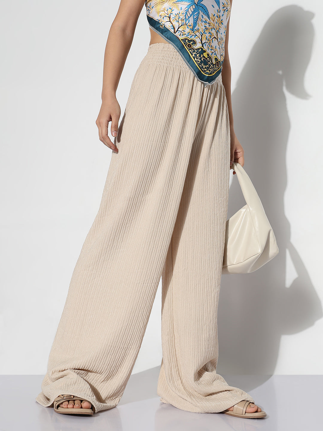 Women Cream Solid Loose Fit Trousers