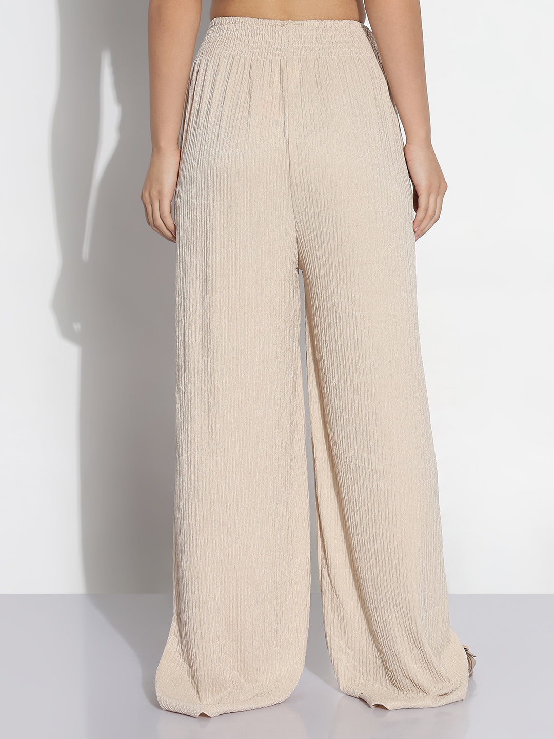 Women Cream Solid Loose Fit Trousers