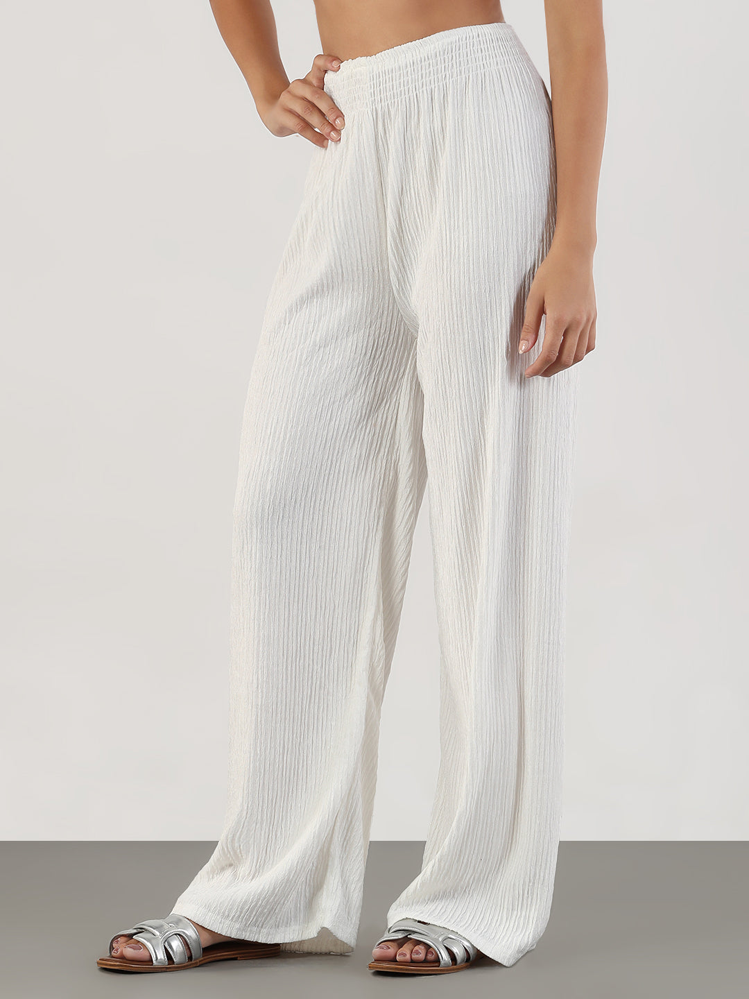 Women White Loose Fit Solid Parallel Trousers