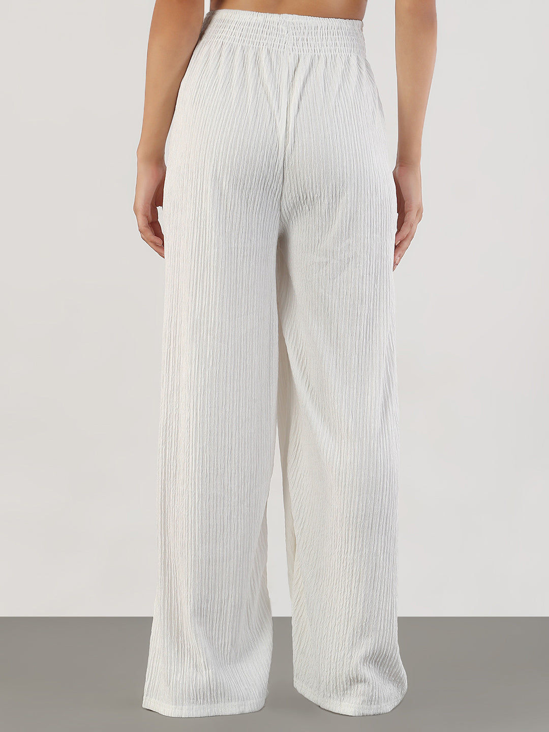 Women White Loose Fit Solid Parallel Trousers