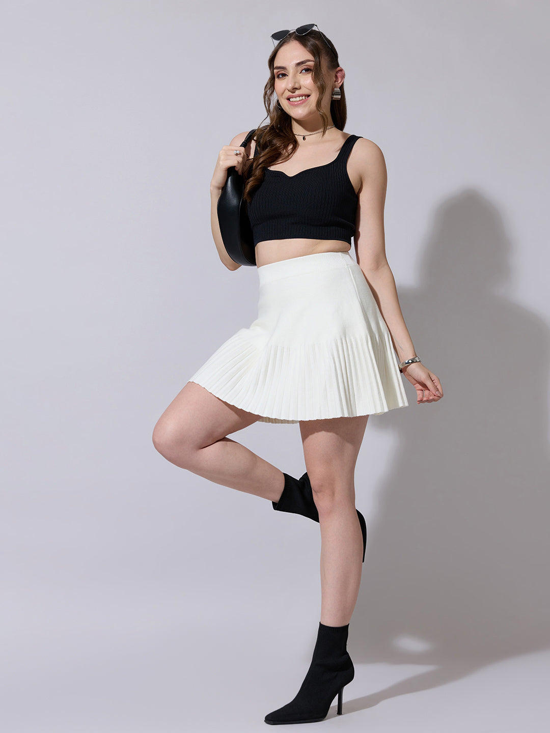 Women's Solid Pleated Off White Knit Mini Skirt