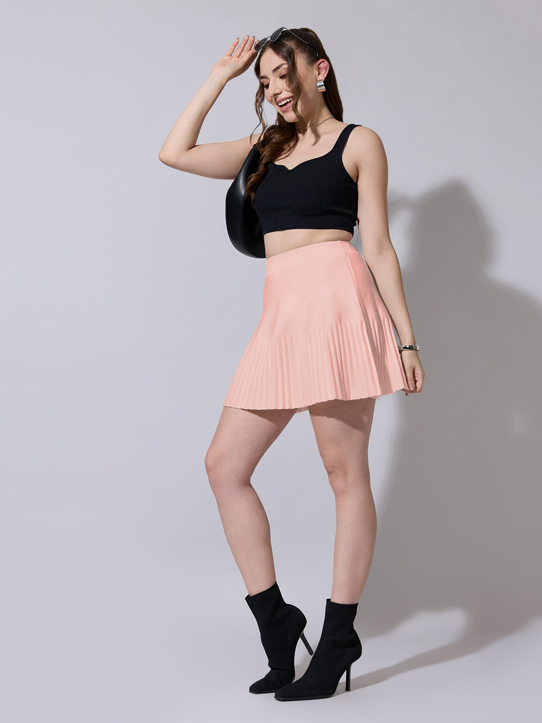 Women's Solid Pleated Pink Knit Mini Skirt