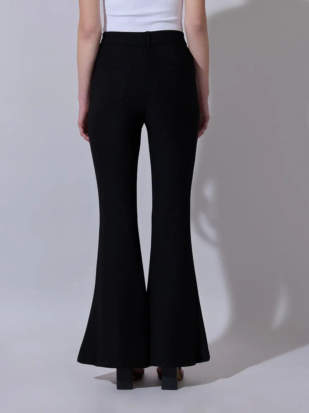 Women's Black Relaxed Fit Flared Trousers - Uncategorized from SHOWOFFFF