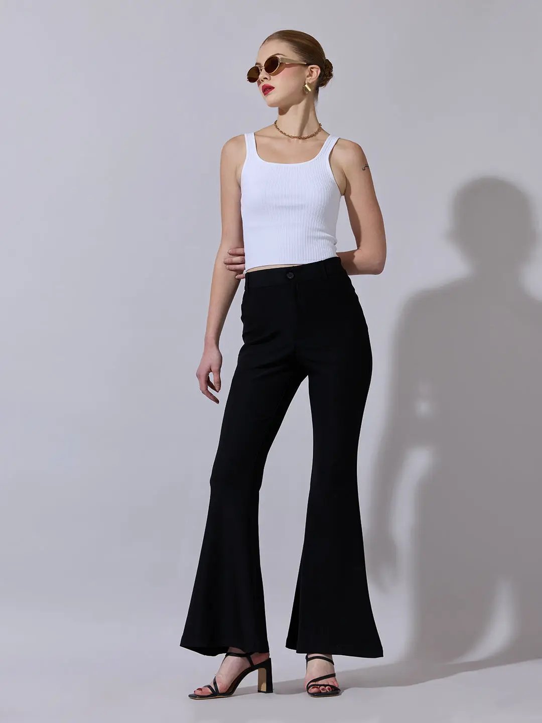 Women's Black Relaxed Fit Flared Trousers - Uncategorized from SHOWOFFFF