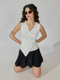 Women's White Sleeveless V-Neck Ruched Asymmetric Top with Brooch Detail