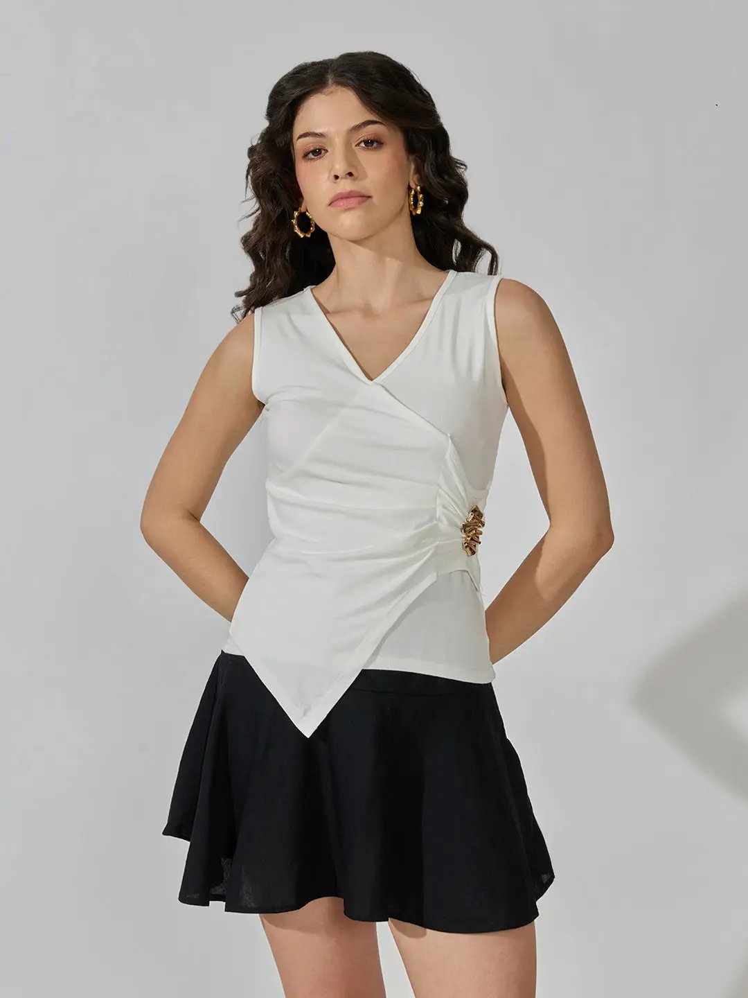 Women's White Sleeveless V-Neck Ruched Asymmetric Top with Brooch Detail