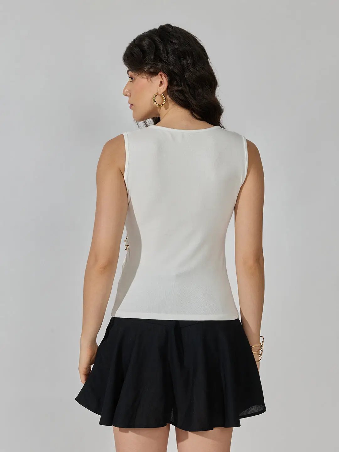 Women's White Sleeveless V-Neck Ruched Asymmetric Top with Brooch Detail