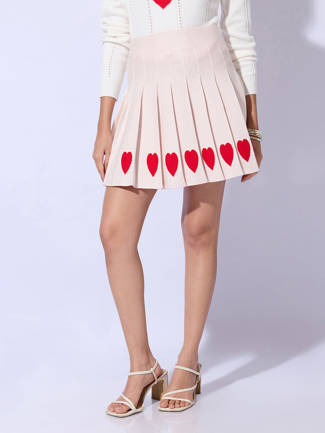 Women's Pleated Peach Mini Skirt with Heart Detail