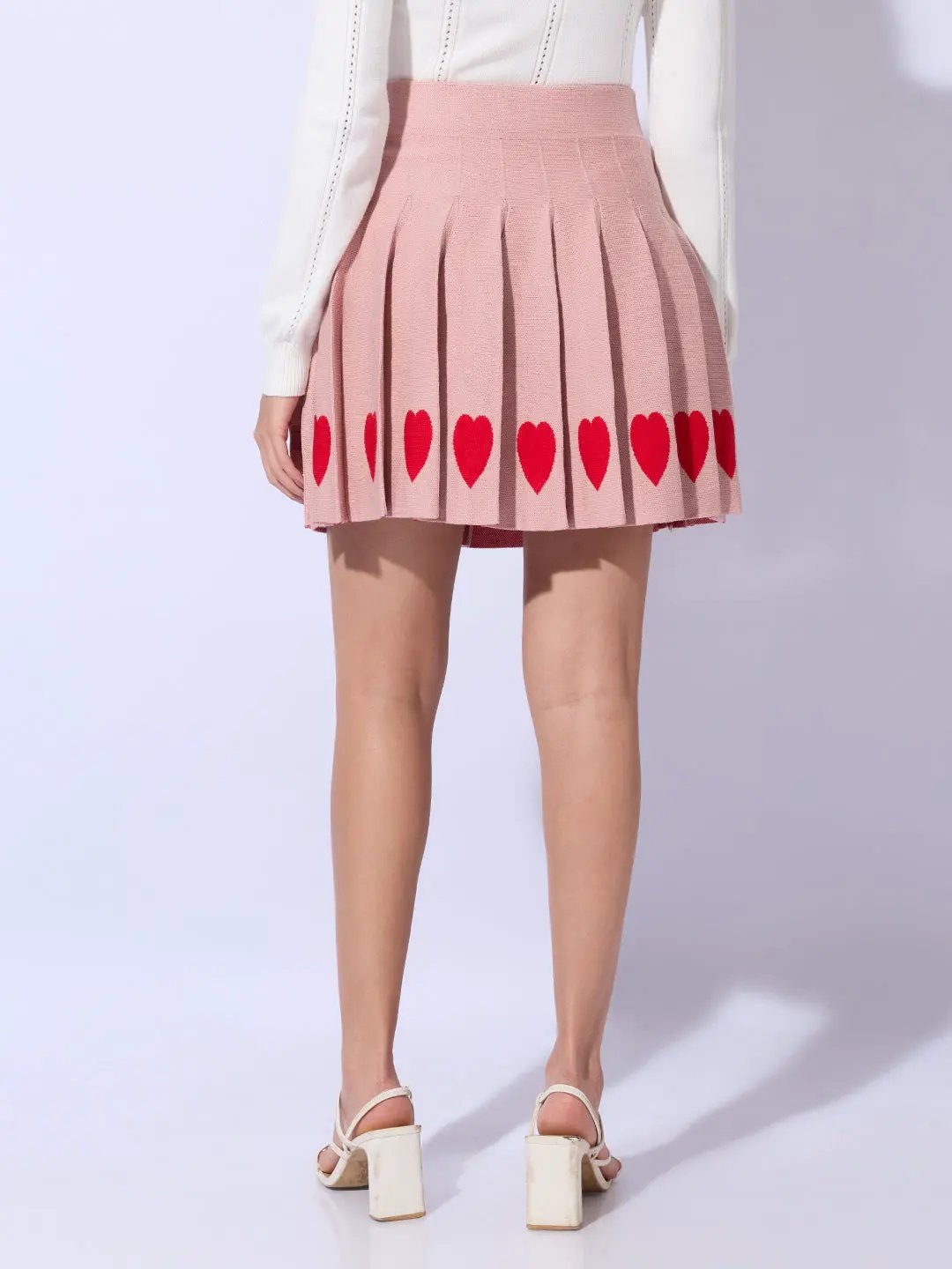 Women's Pleated Pink Mini Skirt with Heart Detail - Uncategorized from SHOWOFFFF