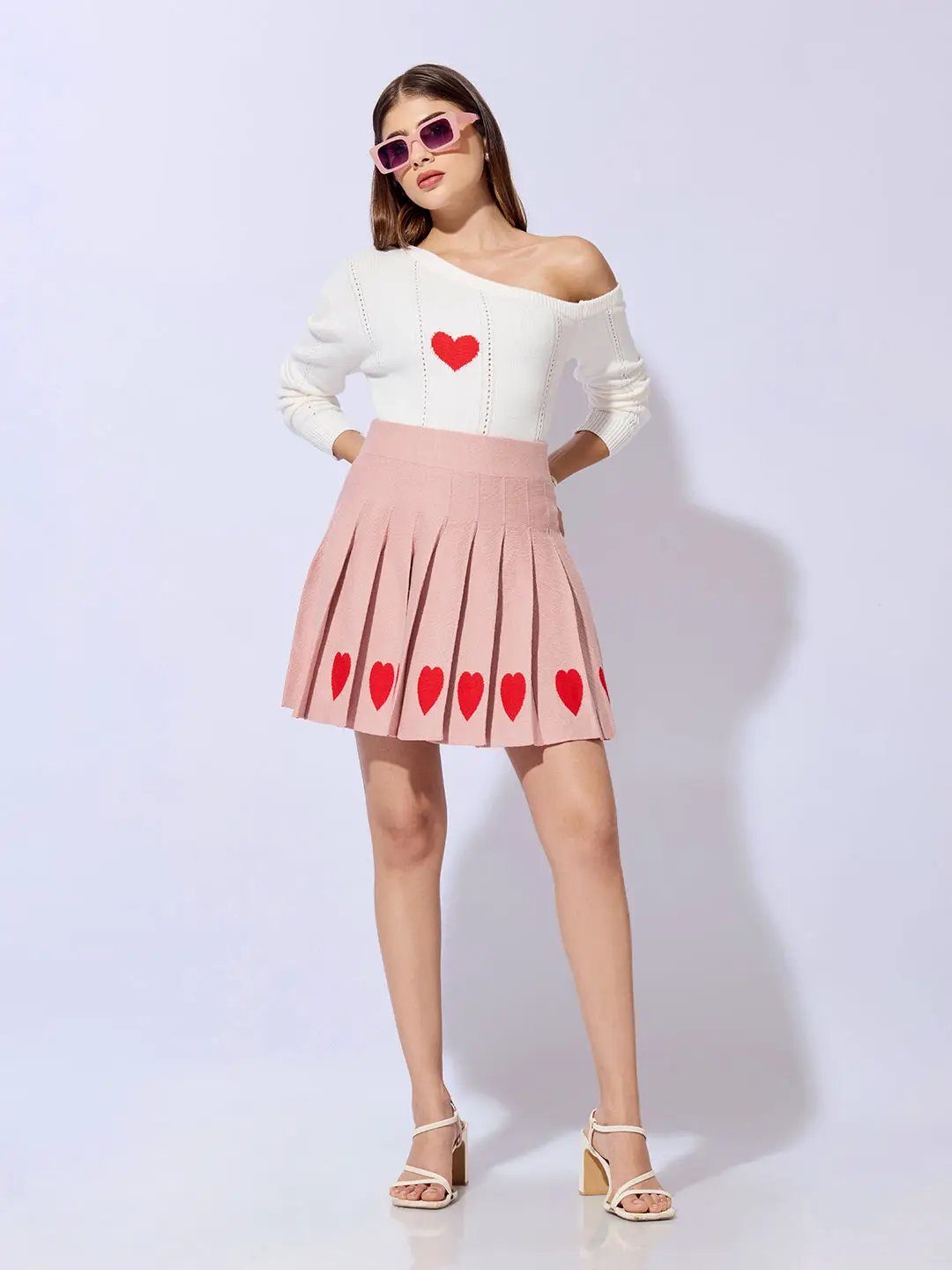 Women's Pleated Pink Mini Skirt with Heart Detail - Uncategorized from SHOWOFFFF