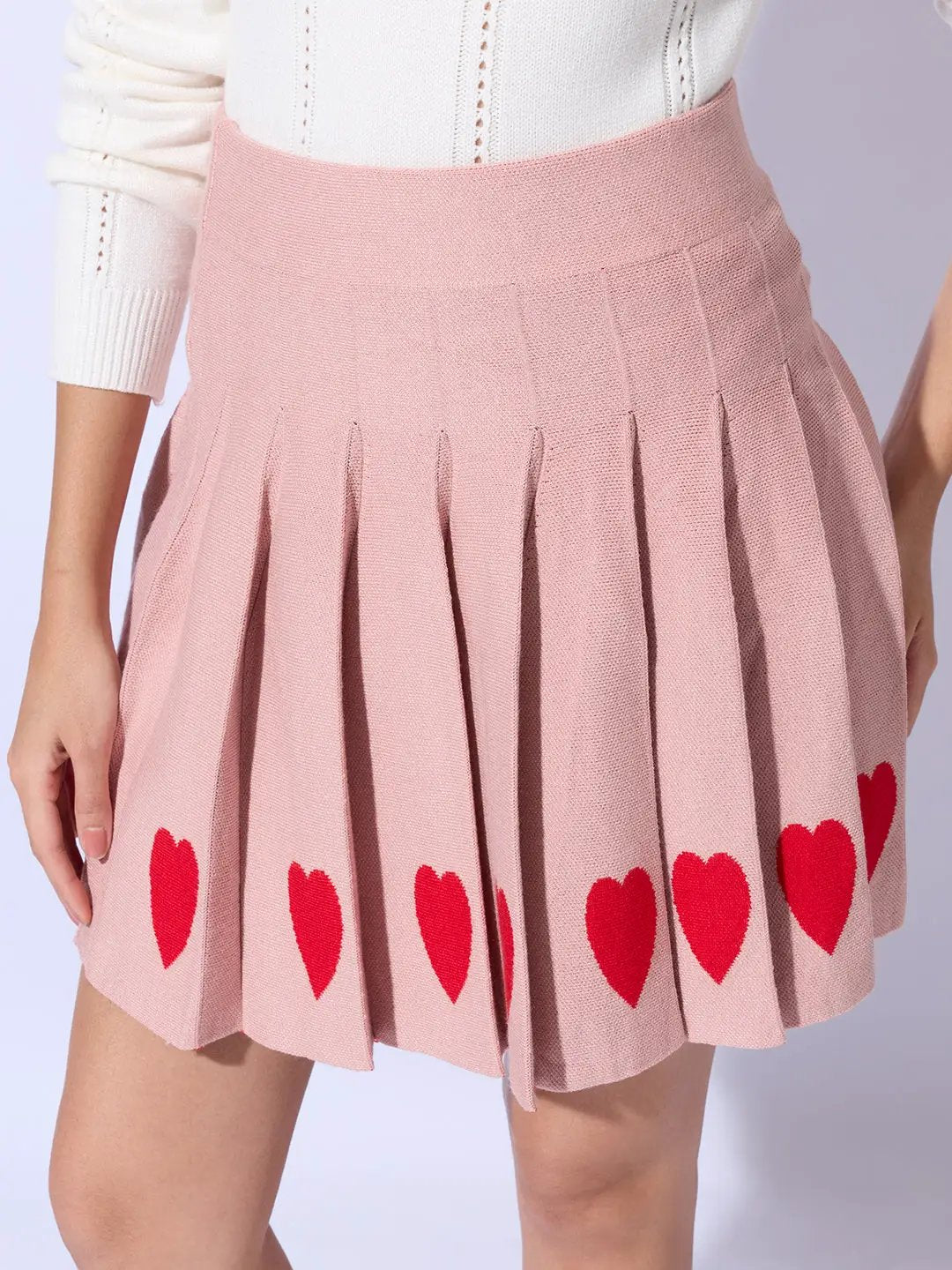 Women's Pleated Pink Mini Skirt with Heart Detail - Uncategorized from SHOWOFFFF