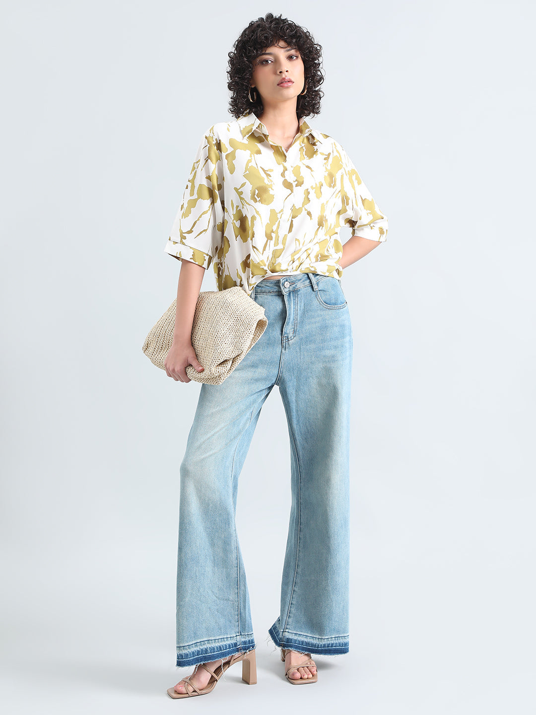 Women’s Cream Floral Print High-Low Hem Shirt with Front Twist Detail