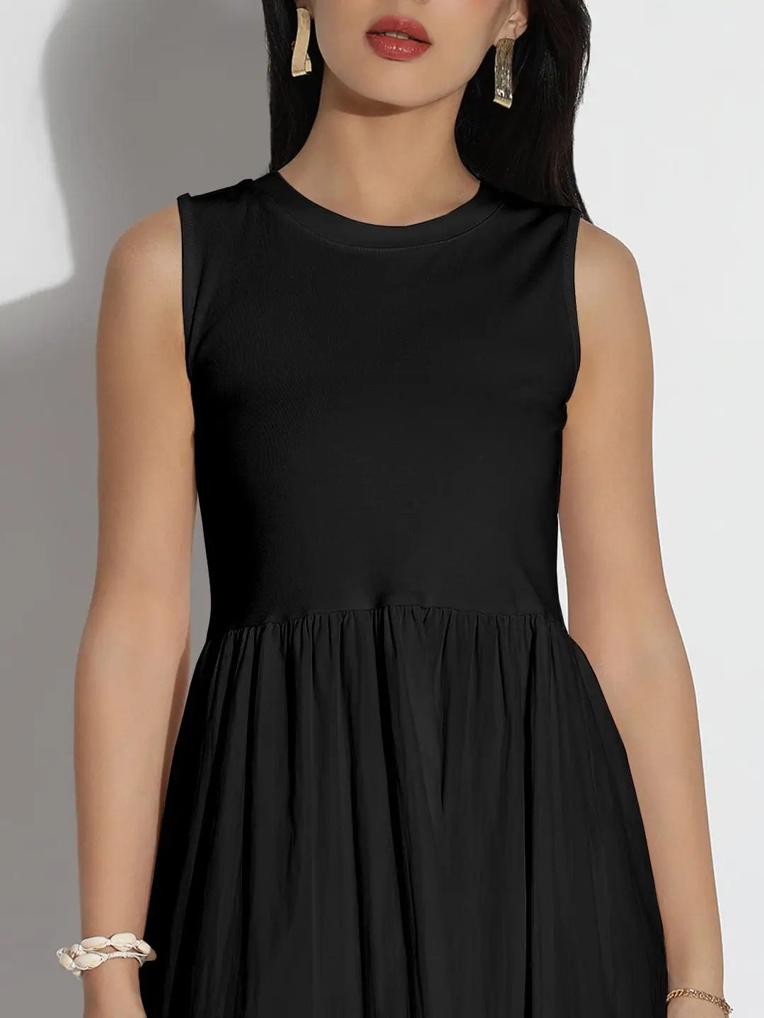 Women's Black Sleeveless Flared Midi Dress with Gathered Detail - from SHOWOFFFF