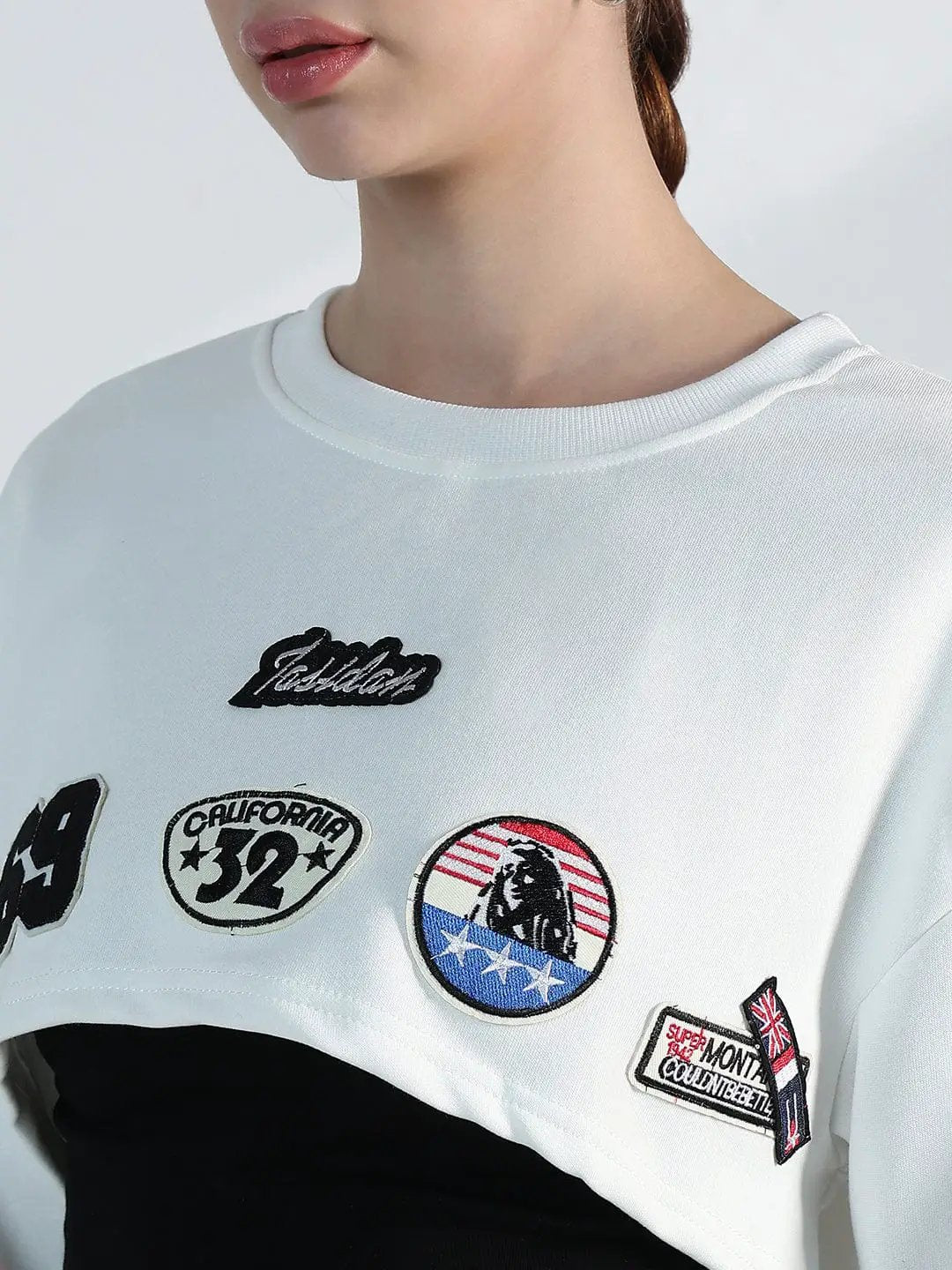 Women's Graphic White Patch Crop Sweatshirt - Uncategorized from SHOWOFFFF