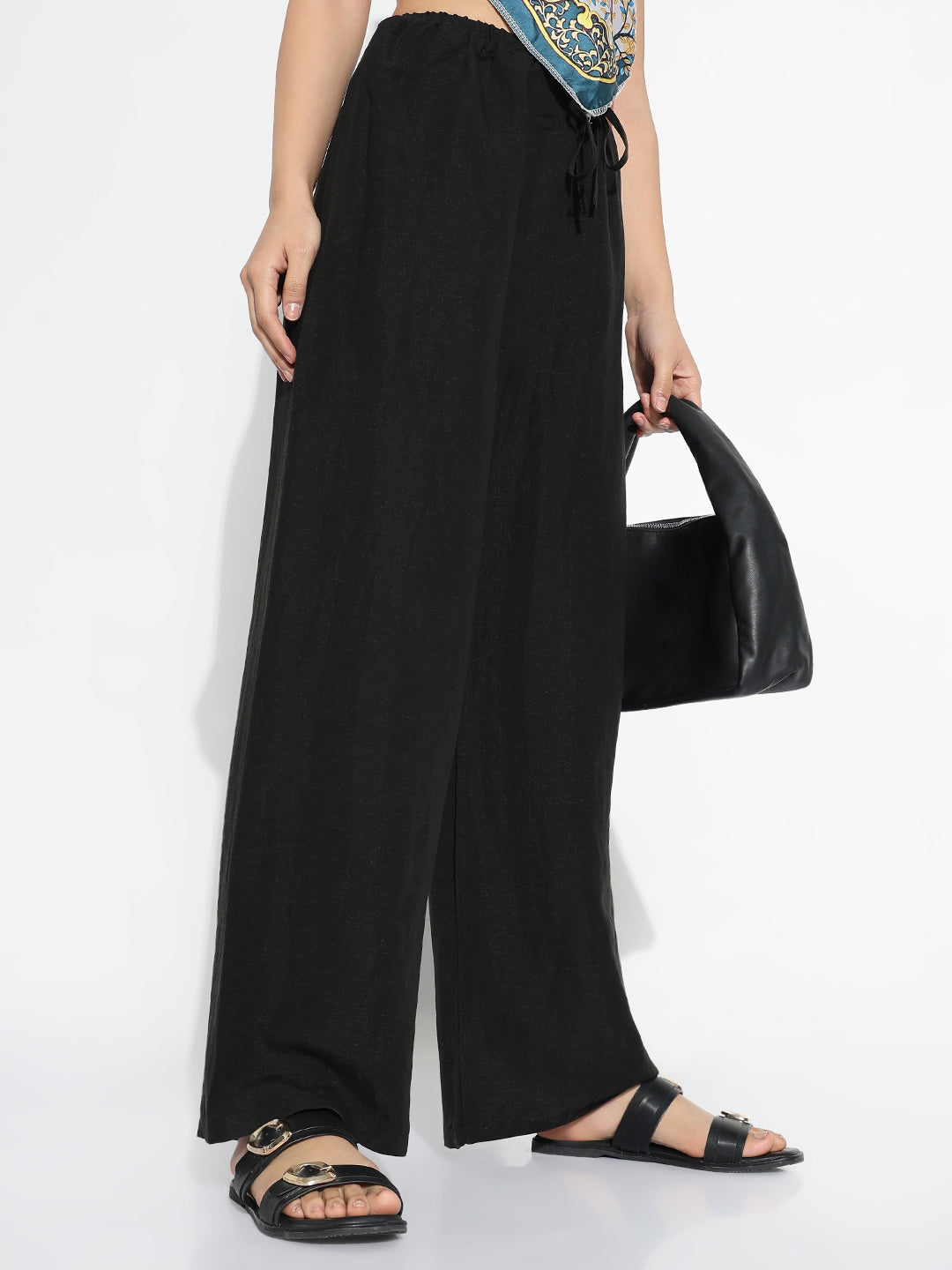 Women Black Solid Loose Fit Trousers