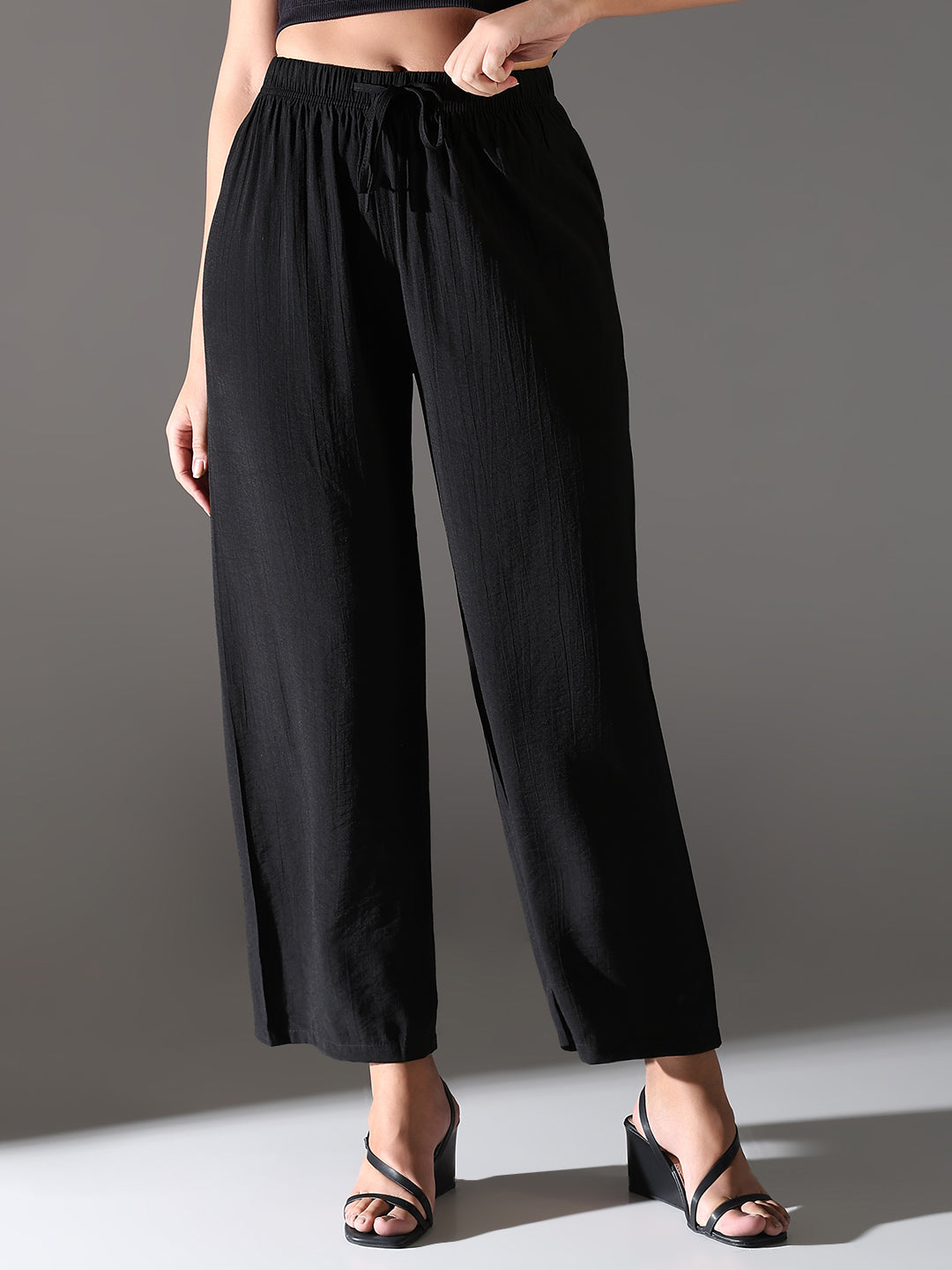 Women Black Solid Parallel Trousers