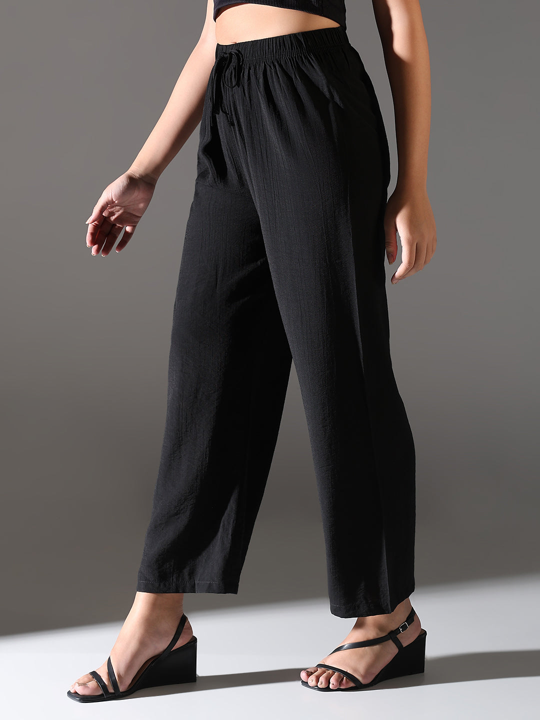 Women Black Solid Parallel Trousers