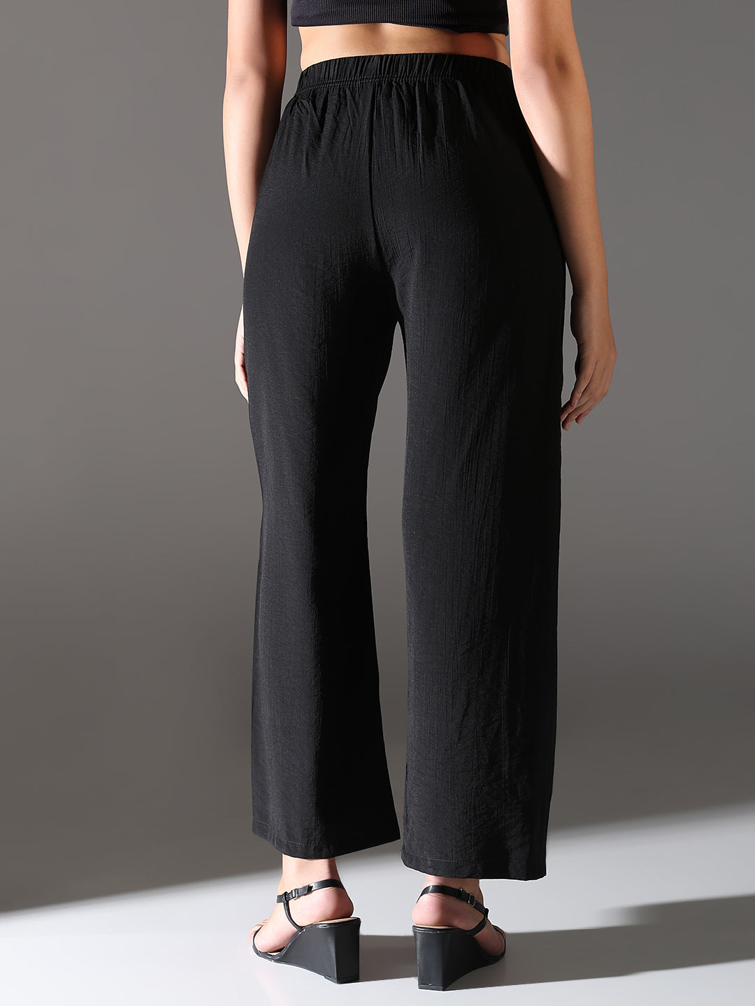 Women Black Solid Parallel Trousers