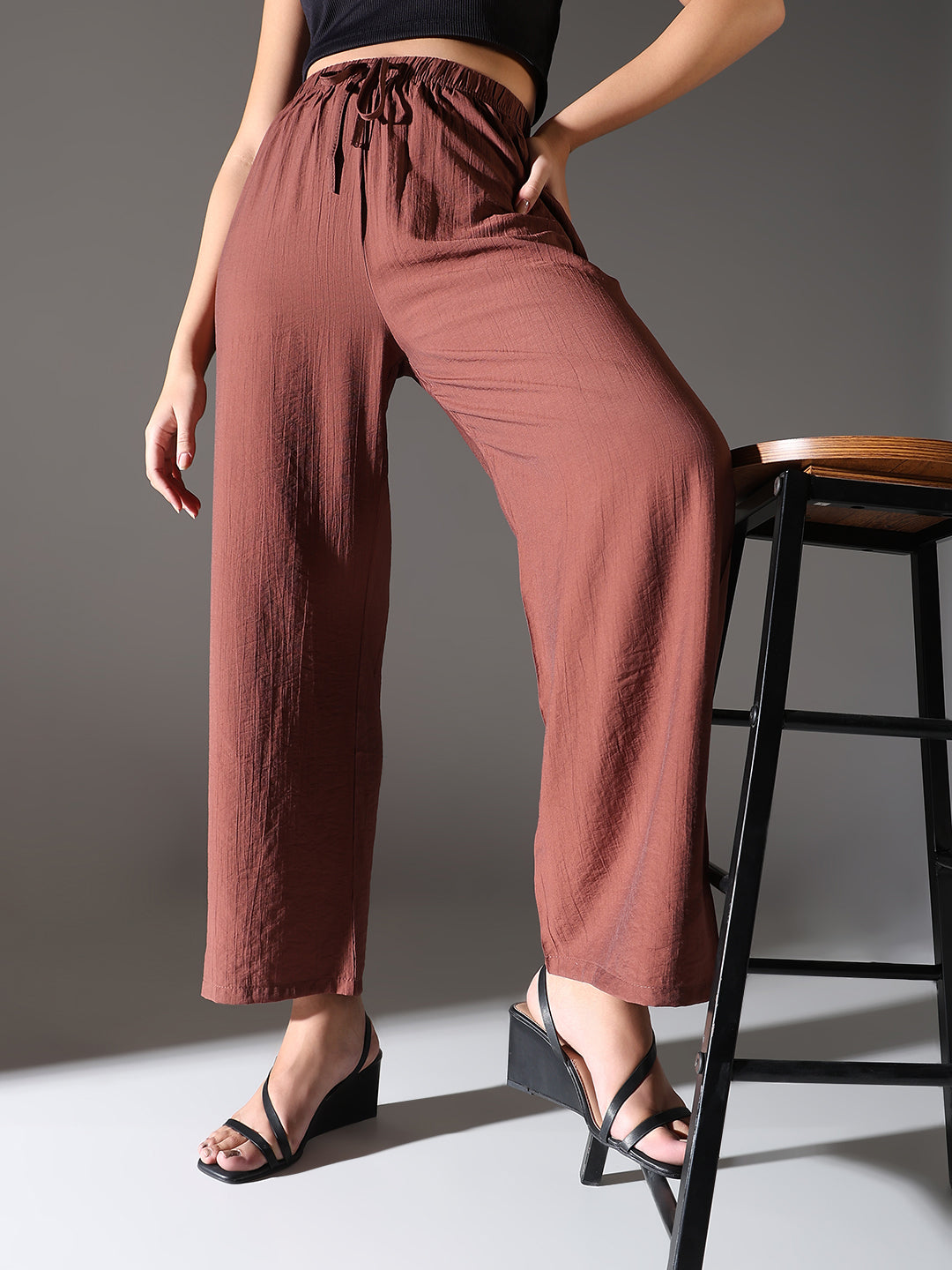 Women Brown Solid Parallel Trousers