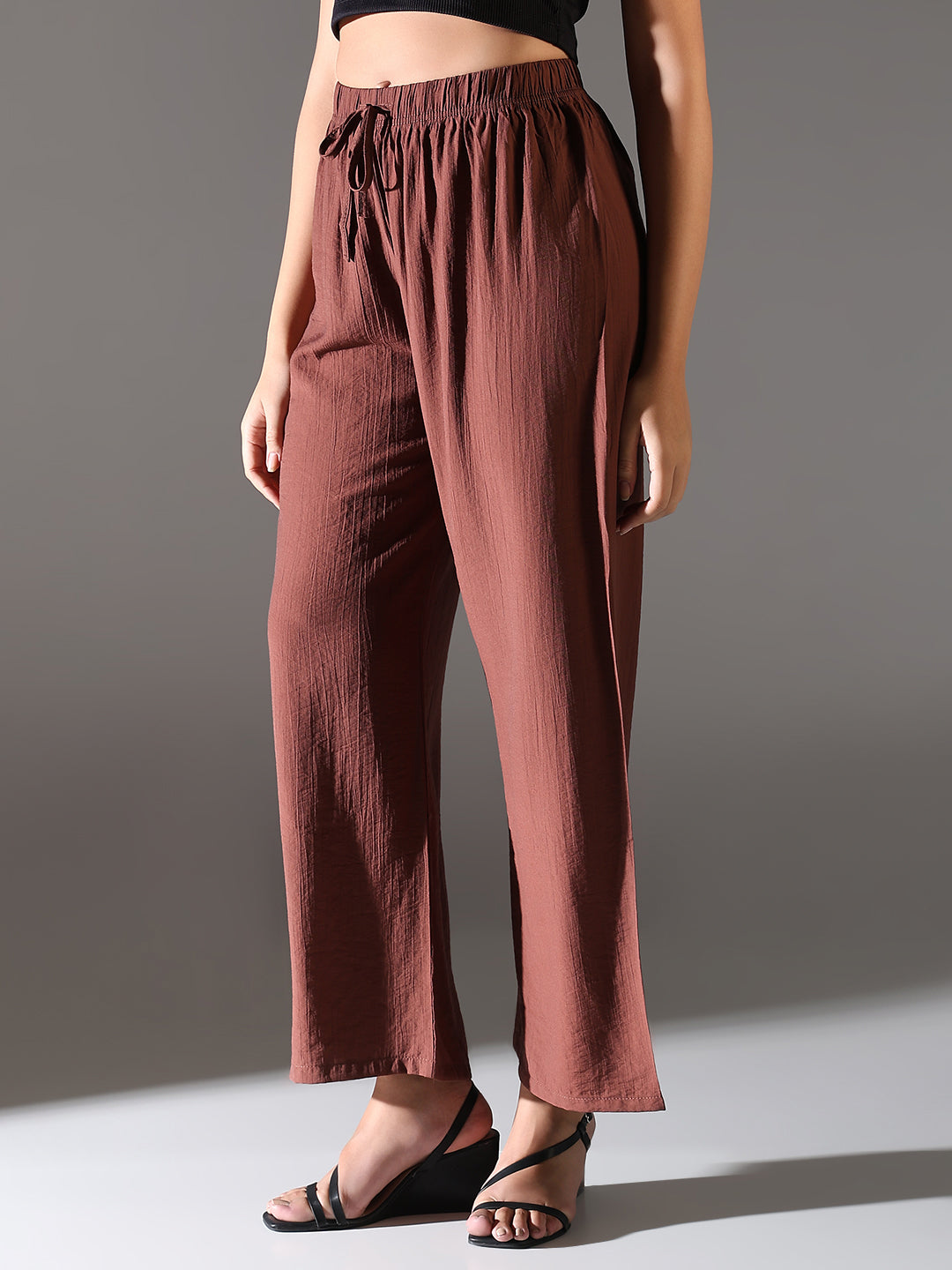 Women Brown Solid Parallel Trousers