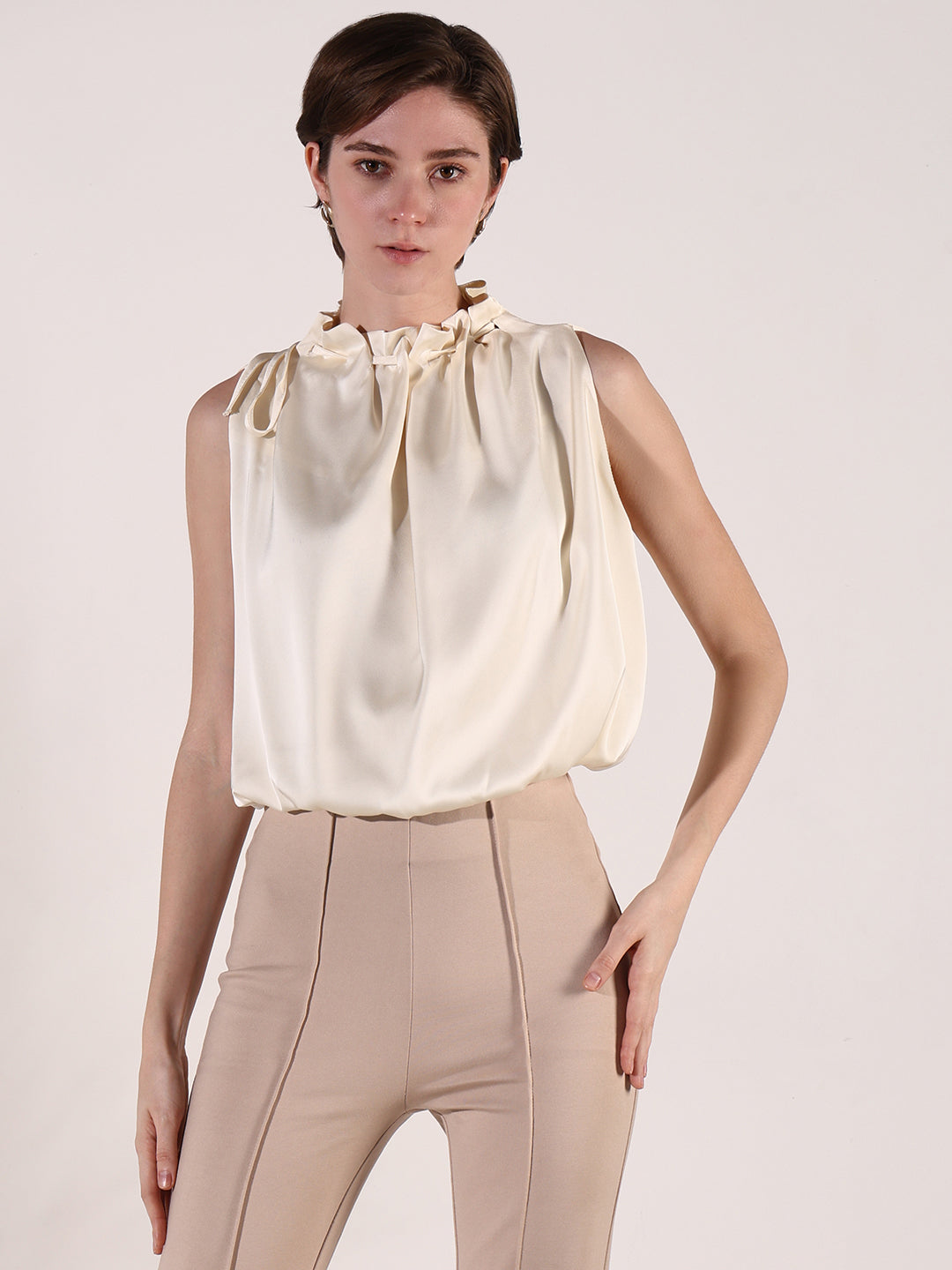 Women Cream Solid Top