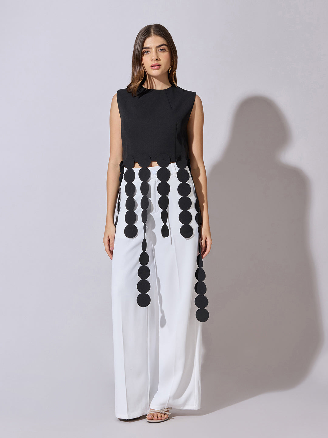 Women's Black Sleeveless Top with Circular Tassel Detail