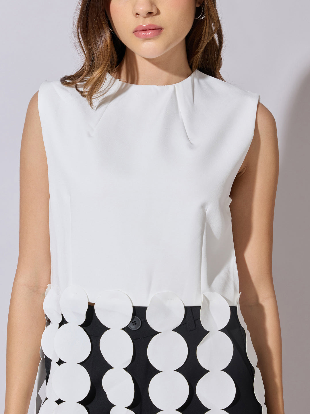 Women's White Sleeveless Top with Circular Tassel Detail