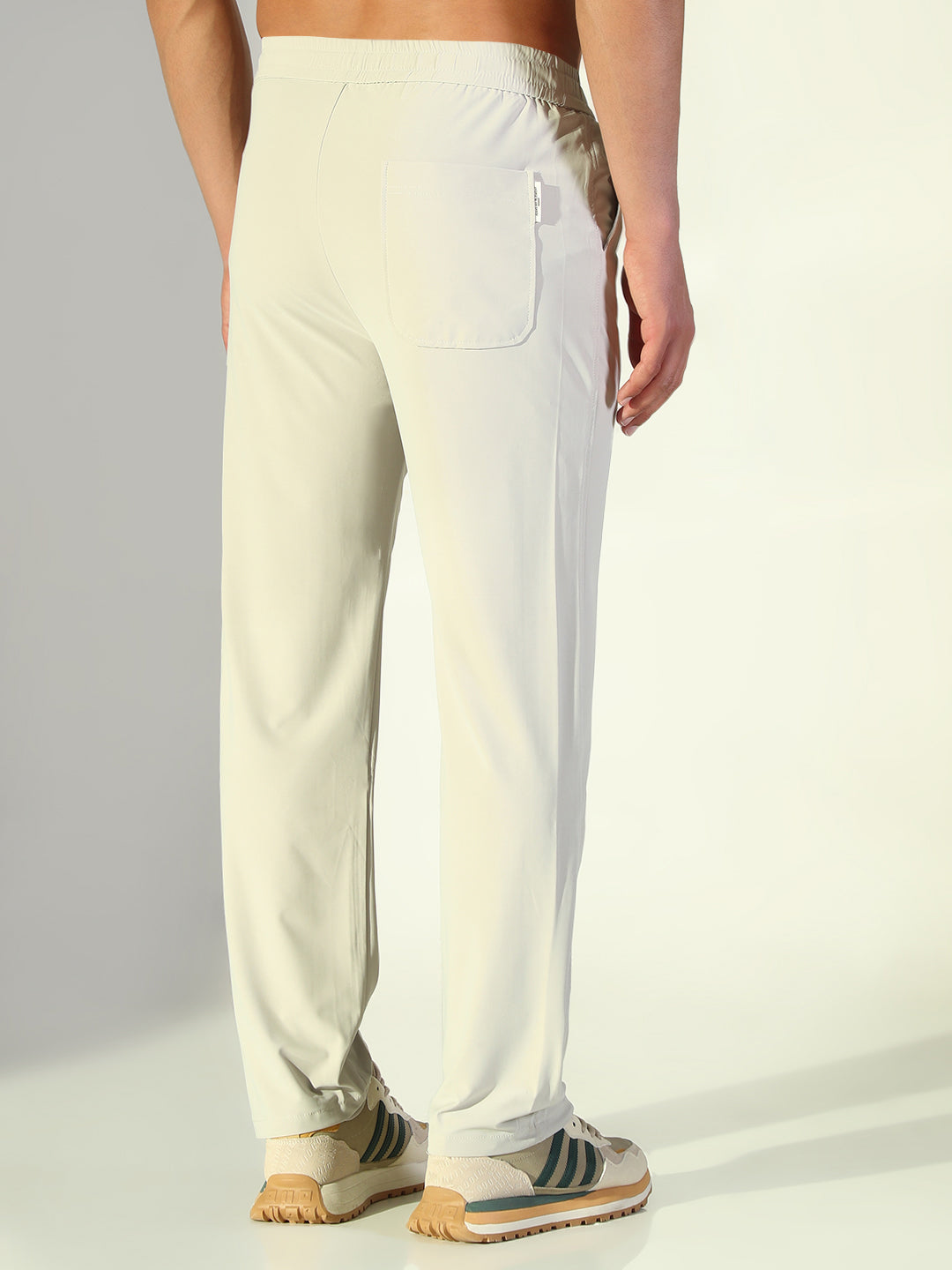 Men Cream Solid Straight Fit Trousers