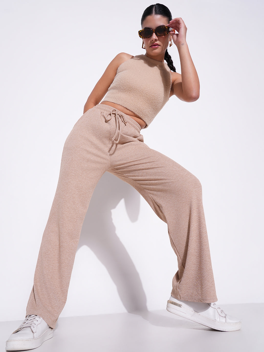 Women Beige Solid Parallel Trousers