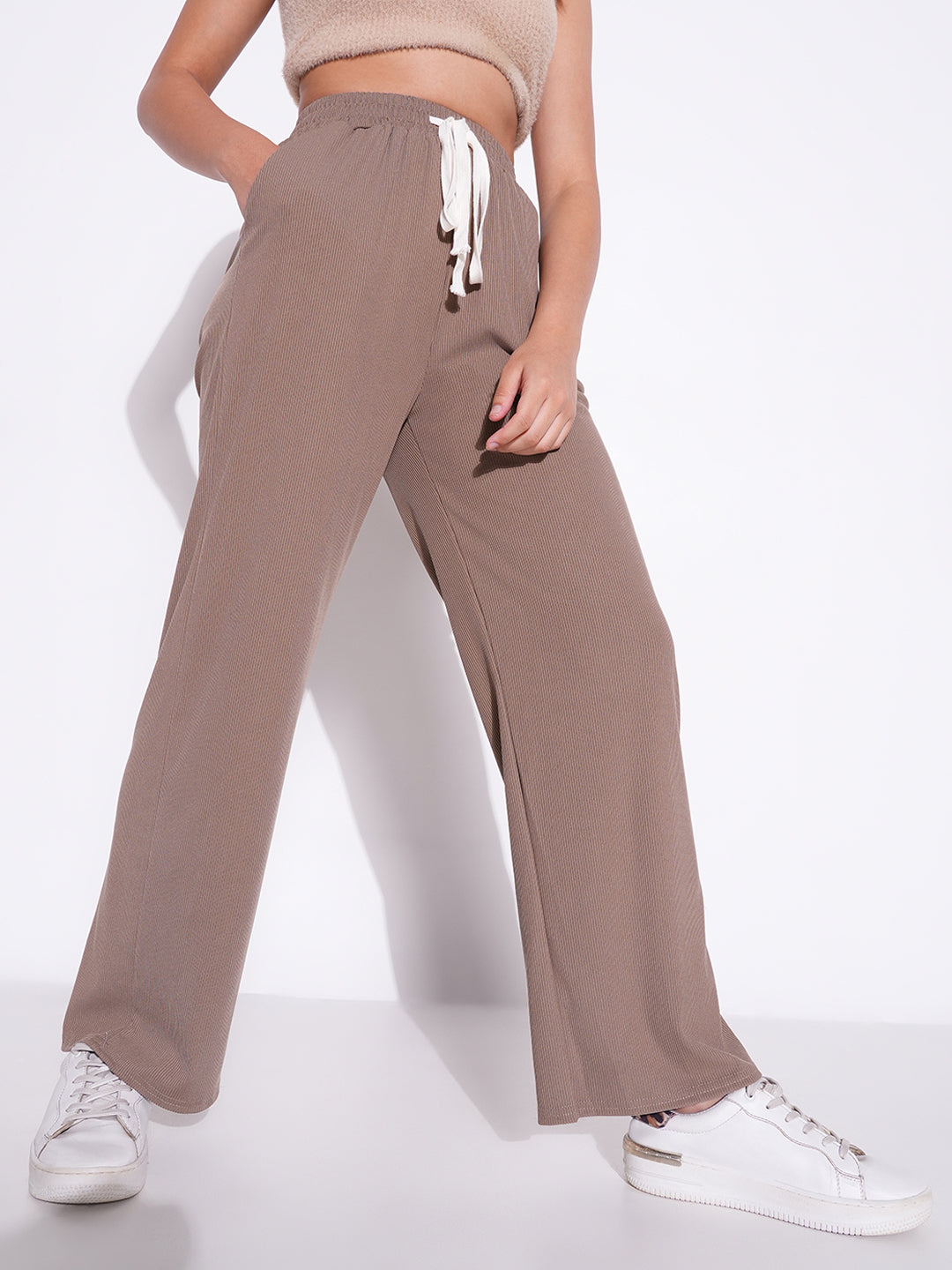 Women Beige Solid Parallel Trousers