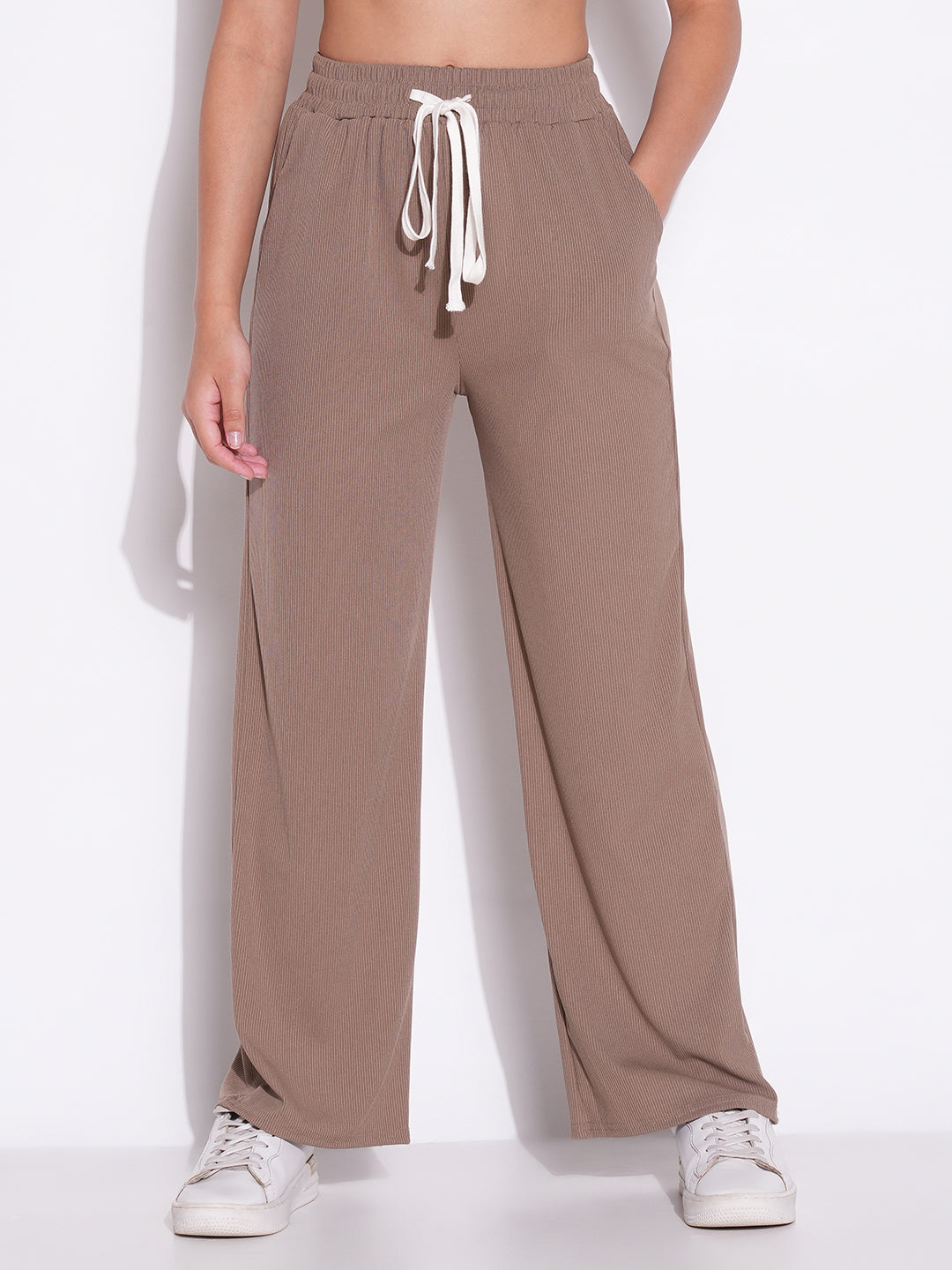 Women Beige Solid Parallel Trousers