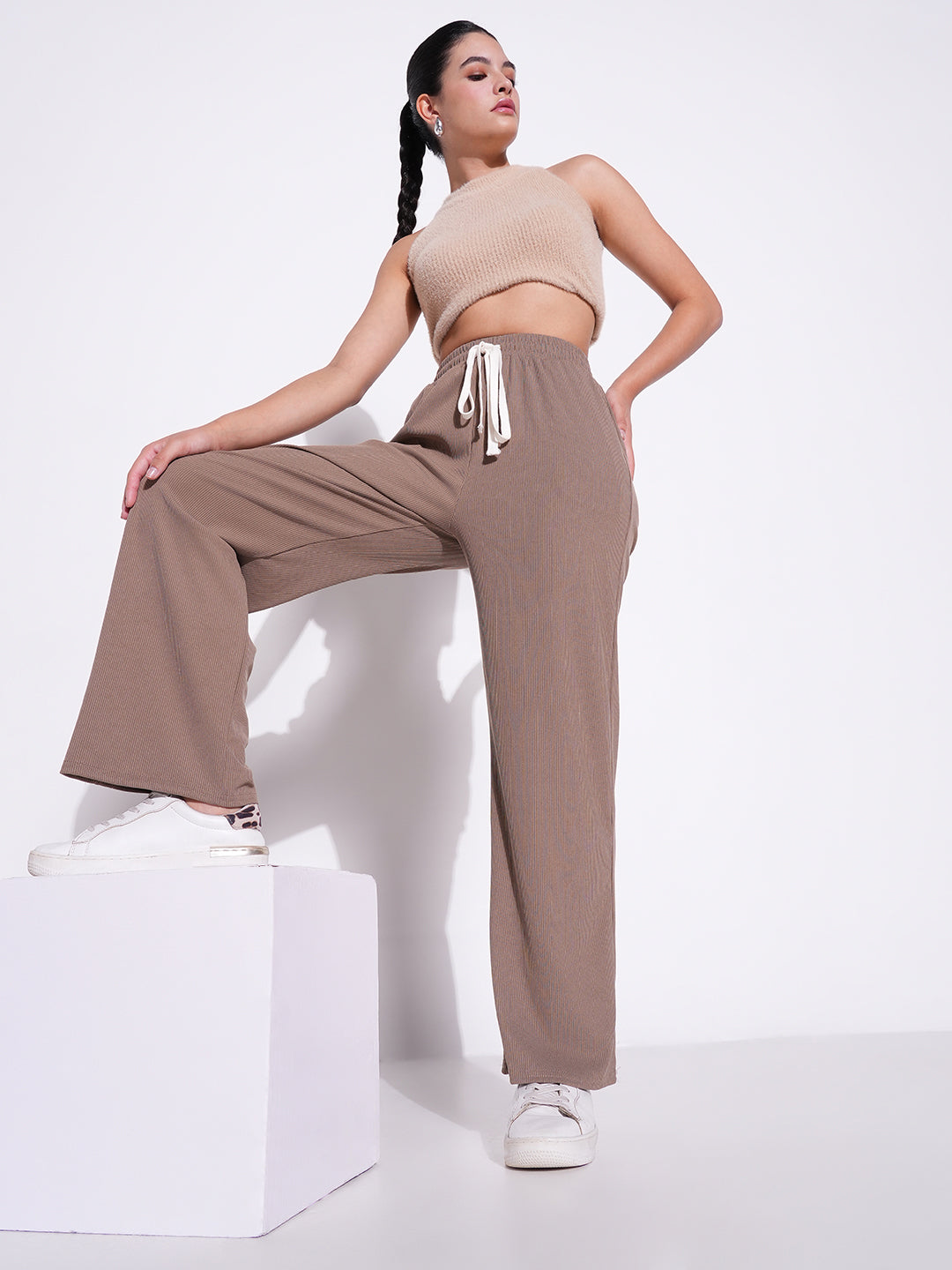 Women Beige Solid Parallel Trousers