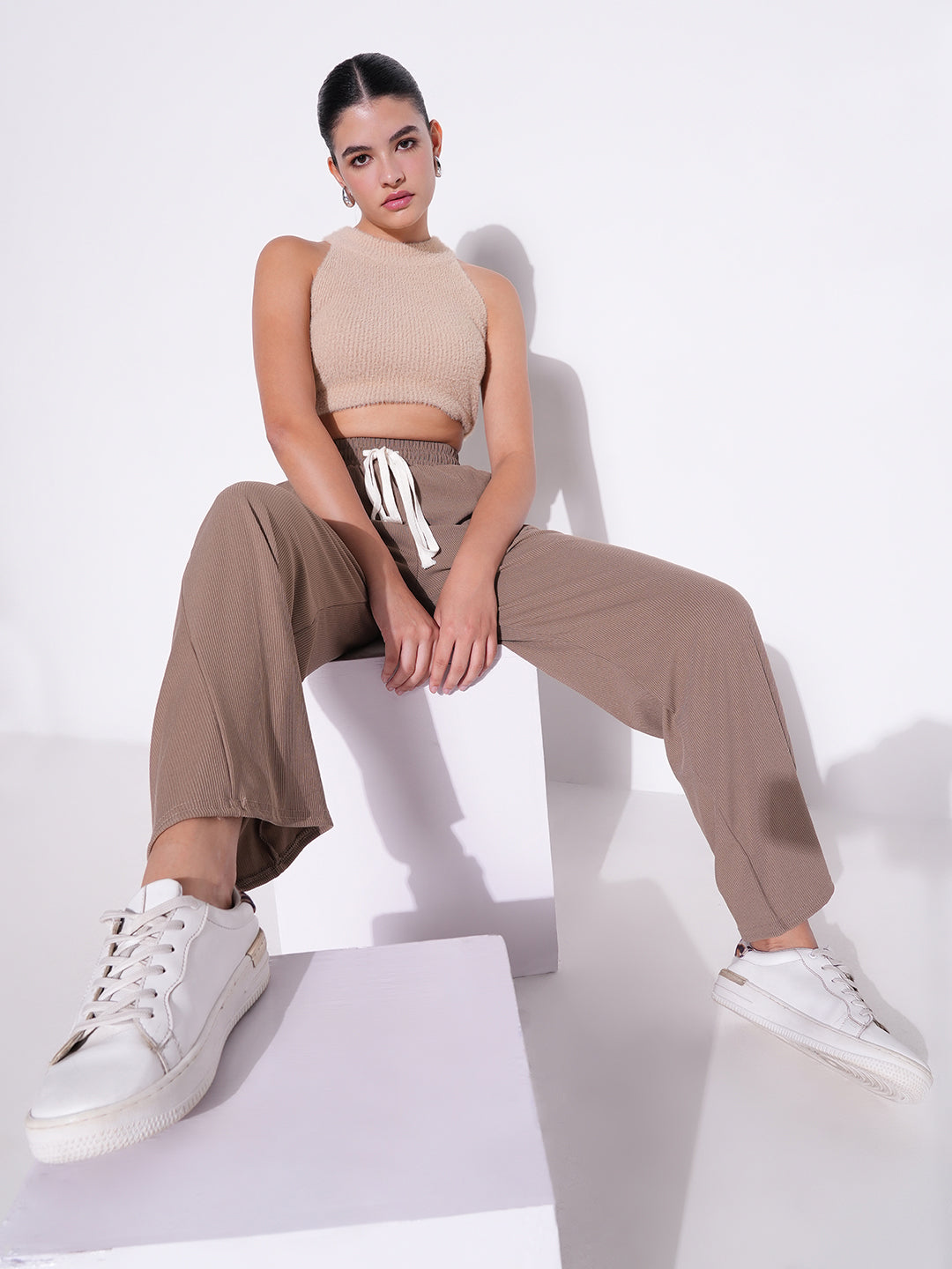 Women Beige Solid Parallel Trousers