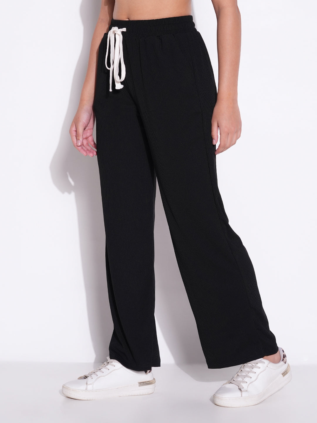 Women Black Solid Parallel Trousers